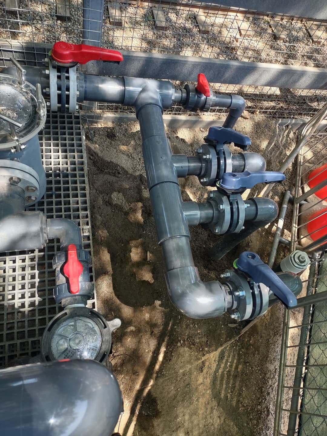 Industrial plumbing system with valves and pipes, showcasing a durable design and functionality.